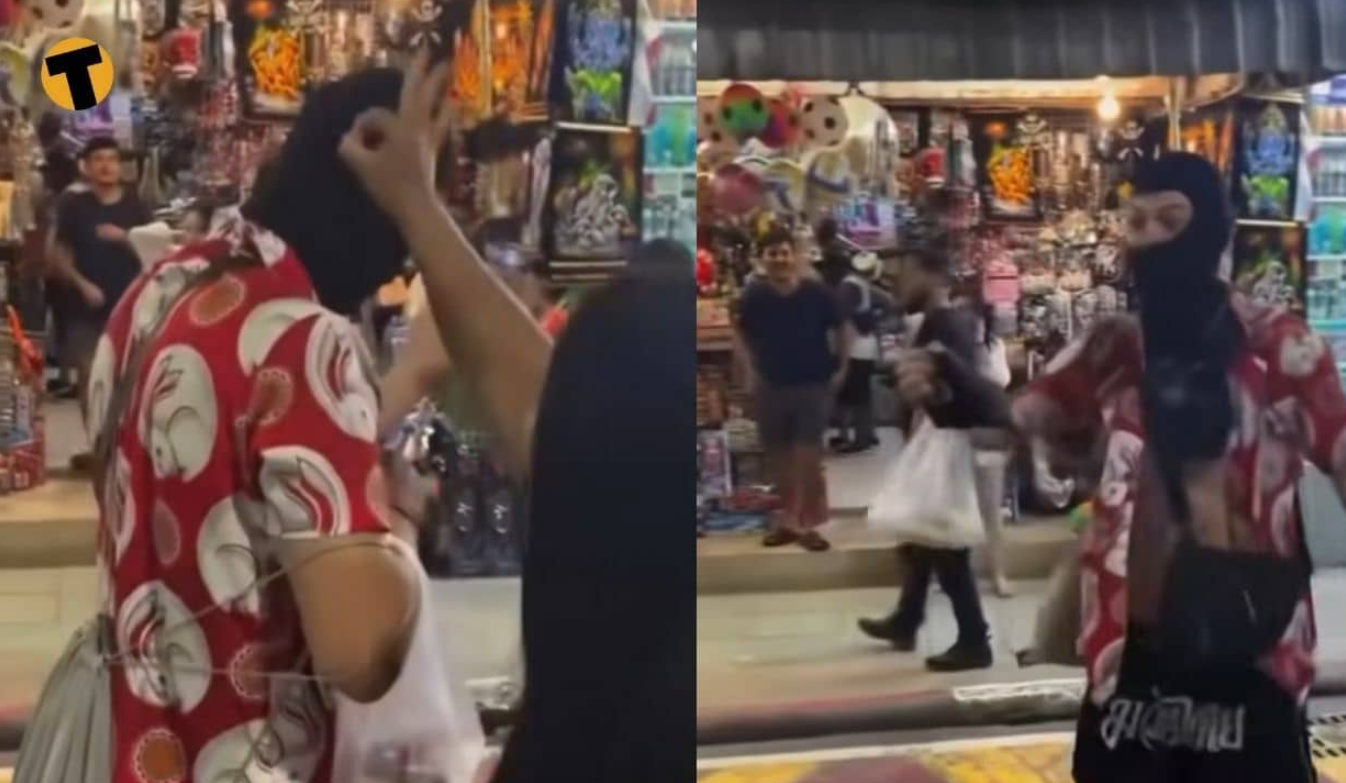 ▲▼他頭頂「寵物蟑螂」逛街！泰國阿姨太熱心　下秒伸手彈飛。（圖／Facebook／翻攝自อีซ้อขยี้ข่าว）